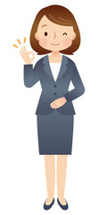 オーケーサインをする女性　スーツ