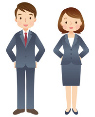 腰に手をあてて立つ男女　ビジネスマン