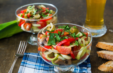 Italian salad with cherry tomatoes, mushrooms, sweet peppers and
