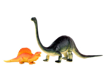 plastic dinosaurs on a white background