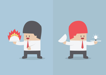Businessman holding tray with fire and light bulb of idea, Hot d