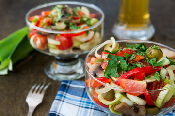 Italian salad with cherry tomatoes, mushrooms, sweet peppers and