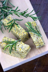 Baked polenta with italian cheese and rosemary
