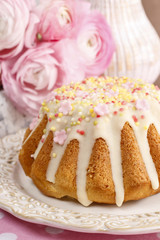 Traditional easter cake decorated with icing and colorful sprink