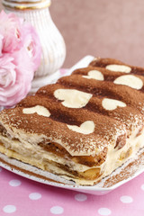Tiramisu cake decorated with hearts