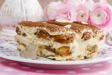 Tiramisu cake decorated with hearts