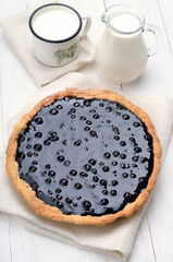 Homemade blueberry pie and milk