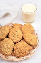 Oatmeal cookies and milkshake in glass