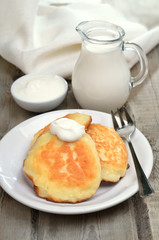 Fritters on rustic table