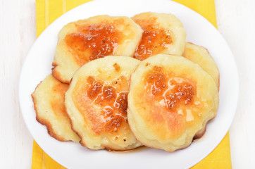 Fritters on white plate