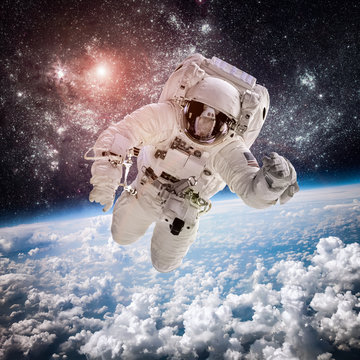 Fototapeta Astronaut outer spac Elements of this image furnished by NASA.