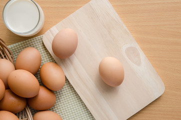 Close up of eggs on wooden table