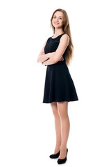 Portrait of young cheerful business woman in full growth.