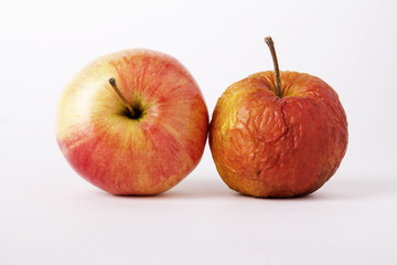 Two apples, young and old as a metaphor for aging 