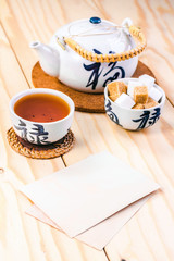 blank card and chinese set of tea