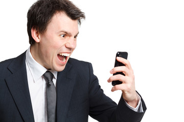 businessman isolated on white shouting at the phone.