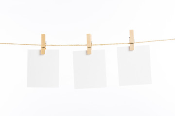 paper cards hanging rope isolated