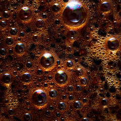 Coffee foam in a cup, photographed macro