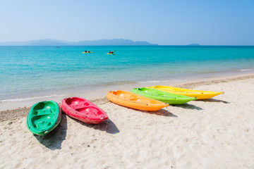 Colorful kayak on tropical beach