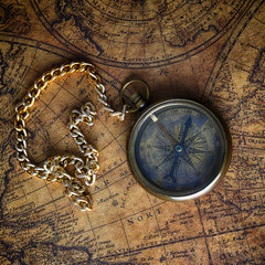 Obraz na płótnie Canvas compass on old map