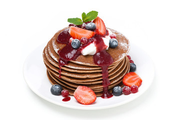 pancakes with cream and fresh berries, isolated