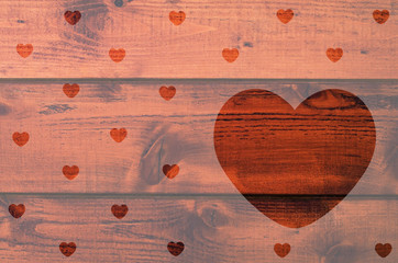Wooden background with heart shaped space for text.