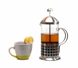 french press and cup of tea on a white background