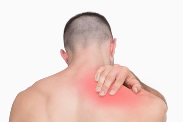 Naklejka premium Rear view of shirtless man with neck pain