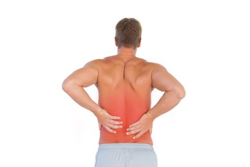 Fototapeta premium Shirtless man suffering from lower back pain