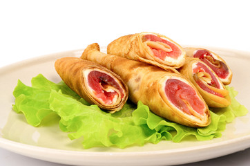 Delicious tortillas on a salad leaf