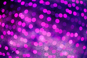 bokeh light background past glass and drop