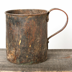 Old copper mug