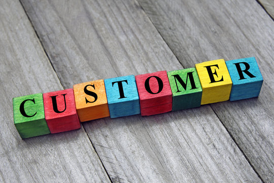 word customer on colorful wooden cubes