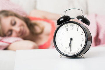Sleepy young woman in bed