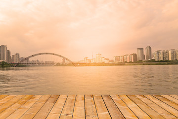 Obraz premium modern city near the river