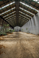 Abandoned industrial interior with bright light