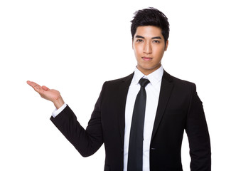 Businessman with hand presentation