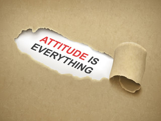 attitude is everything words behind torn paper