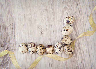 Easter eggs with place for your text on the wooden background