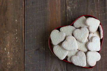 Obraz na płótnie Canvas Heart shape cookies with coconut icing