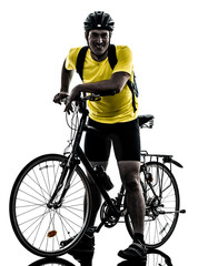 Obraz na płótnie Canvas man bicycling mountain bike standing silhouette