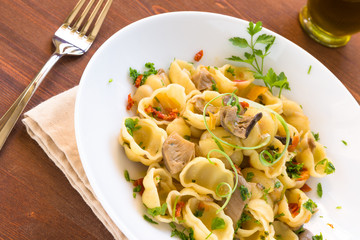 Gnocchi with mushrooms and dried tomatoes, italian cusine
