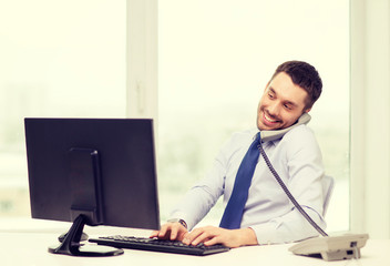 smiling businessman or student with computer