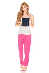 Fototapeta premium Girl in shirt and pants with tablet computer