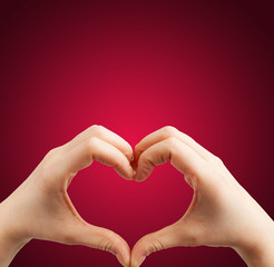 Fototapeta premium Heart hand red background