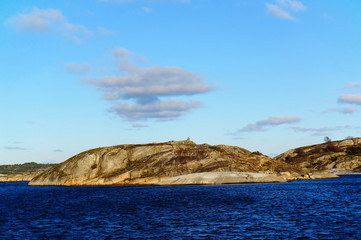 Fototapeta na wymiar Rocky island in Fjord