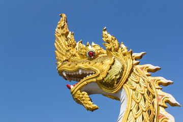 Fototapeta na wymiar Gloden King of Nagas Statue