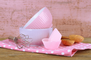 Modern kitchen utensils for baking on color wooden background