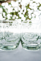 Row of water glasses on the table