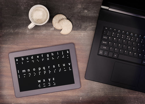 Braille on a tablet, concept of impossibility